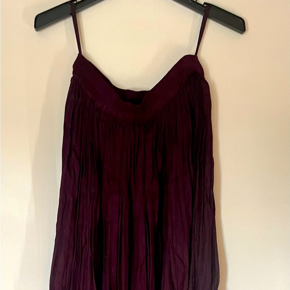 Floor length skirt. Maroon in color